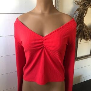 Red cropped long sleeve v neck